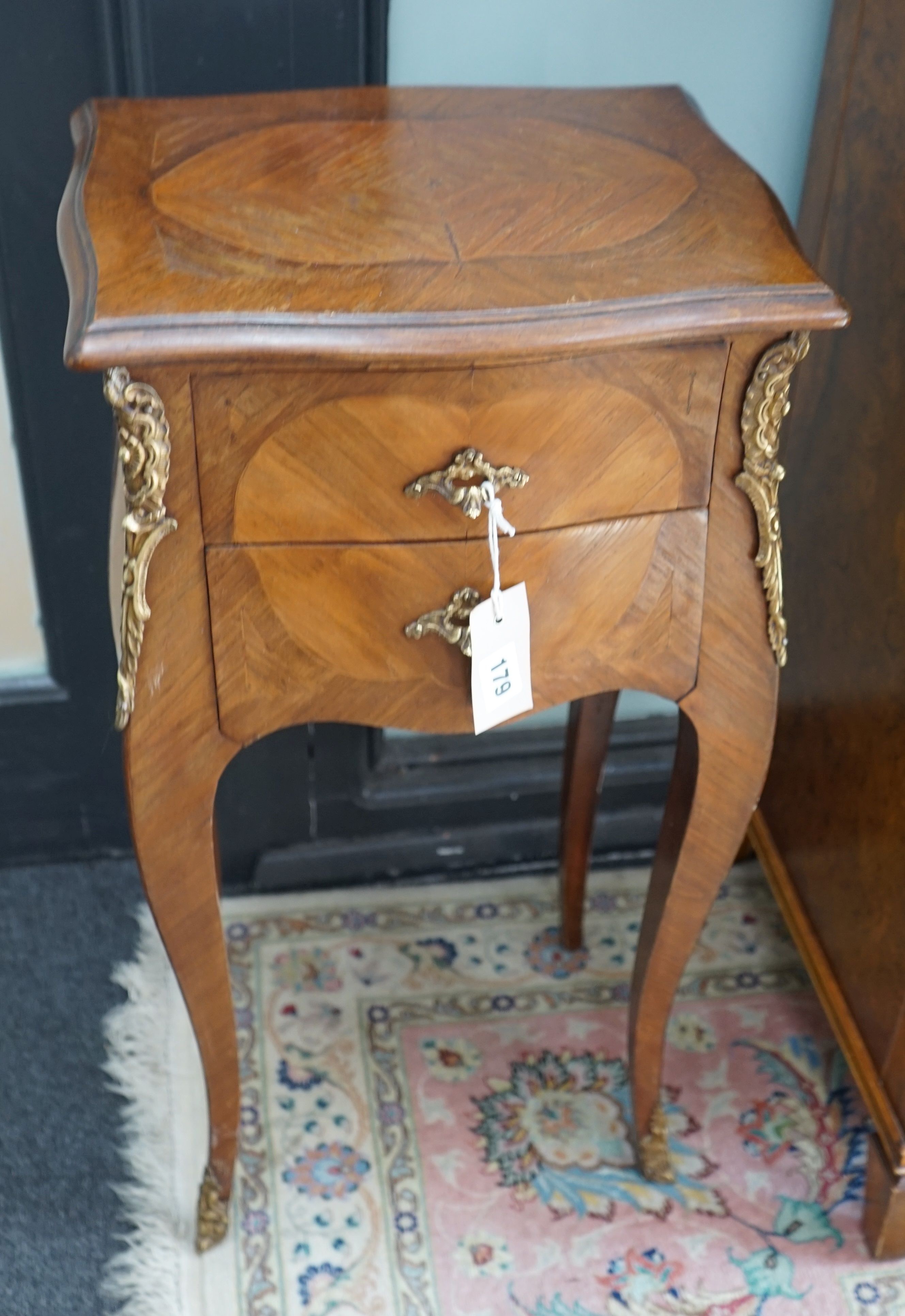 A pair of Louis XVI style serpentine kingwood two drawer bedside chests, width 34cm, depth 26cm, height 78cm